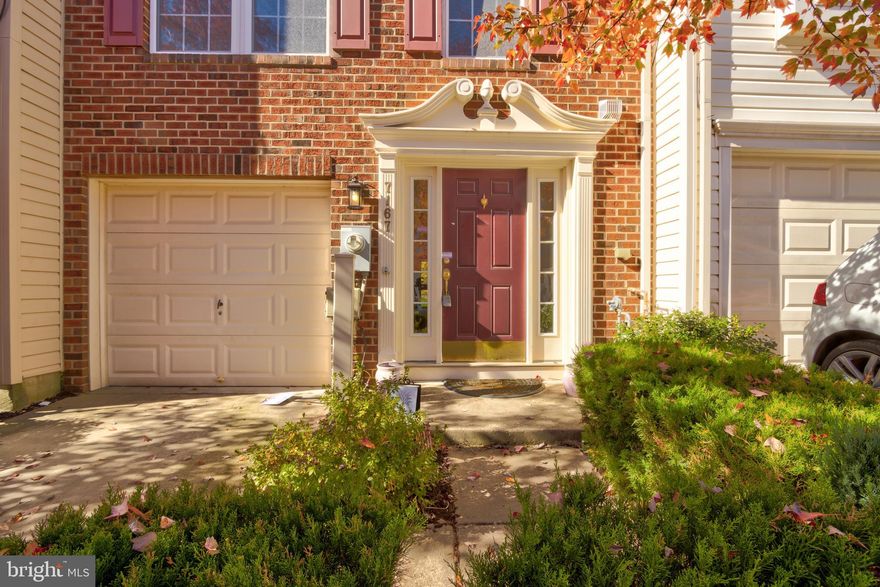 Welcome to 7167 Deep Falls Way...a gorgeous colonial townhome style Condo in the Village Townes community of Elkridge! This stunning home is the largest model in the community and is move-in ready.  It welcomes you with a brick front and three beautiful levels with lots of windows that brings tons of natural light and high-end finishes throughout.

This home features open concept style living including the "bump out" on all three levels which adds significant space.  It boasts 3 bedrooms, 2.5 baths and a one-car garage.  Enter on the basement level with astute architecture meeting you right away or the spacious one-car garage and experience a foyer with easy access to a powder room.  All leading to a carpeted rec/family room.  

The main level offers an oversized living room, separate dining room,  sunroom with a fireplace for extra recreational space that leads to the private deck which backs up to the natural forest area. This chef's kitchen will be a gathering place for friends, family and anyone you entertain. Other kitchen and dining features include, modern flooring, a pantry, ample storage, a breakfast area, a center island with a breakfast bar with storage underneath, black appliances, and modern countertops.

You are immediately invited to relax and unwind in the owner's oasis offering a walk-in closet, vaulted ceiling, soaking tub and a walk-in shower. Two additional well sized bedrooms and a full bath complete the upper-level. 

Major commuter routes include US-1, I-175, and I-95 for easy access to points north and south for all your dining, shopping, and entertainment needs! You won't want to miss your opportunity to own this one!