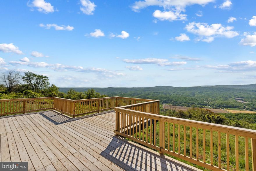 Take a look at this five acre lot with breathtaking Mountain Views! 

Whether you bring your camper or tent for the weekend you won't be disappointed with waking up to this view of the mountains, the valley and nature.  Or simply pack a picnic lunch, and a comfortable chair and spend the day in the peaceful natural beauty of WV.  No matter how you decide to use your time here at this property, you will not be disappointed with the serene and peaceful experience. 
Located just five miles from downtown Romney, if you like to explore and want to experience the quaint home town feeling of Romney there are great local restaurants, historical museums, and boutiques all close by. 

A property like this one doesn't come along every day, schedule your showing soon!