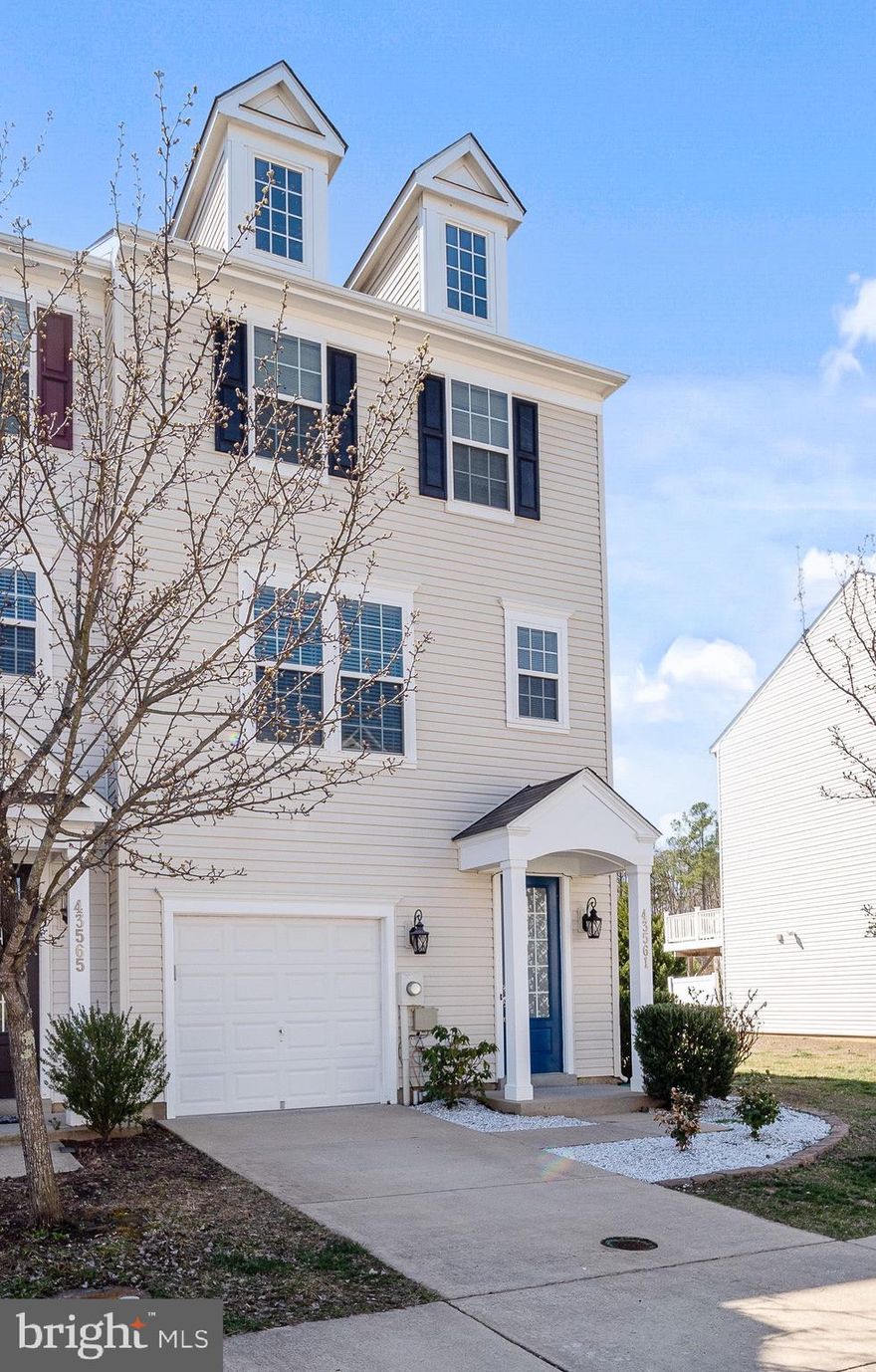 Welcome to this beautiful spacious 4 bedroom, 3.5 bathroom end unit townhome offering a perfect blend of comfort and convenience.  Located in the highly desired community of Wildewood this move in ready home has been completely updated and features  fresh paint, brand new flooring including refinished hardwood on the lower level and kitchen, and brand new carpet throughout the entire house.  Upon entry you'll find a versatile lower level room with sliding glass door leading to the backyard.  Room is ideal for a guest suite, home office, or recreation space and includes a full bath.  There is also a garage entry door that lead to the lower level.  The main level boasts a stunning open concept kitchen and living area, ideal for entertaining.  The kitchen features brand new appliances, including refrigerator, range, dishwasher and microwave, ample cabinetry and plenty of countertop space with luxury granite countertops.  Kitchen flows seamlessly into living and dining area and sliding glass door leads you to the brand new composite deck perfect for outdoor dining and relaxation.  Upstairs, you will find the laundry area along with the primary suite that includes a private bathroom and generously sized walk in closet.  An additional two bedrooms and full bath also occupy the upstairs level.  As an end unit home you get to enjoy extra privacy along with additional windows for more natural light.  Community offers a pool area, tennis courts, walking trails and playgrounds.  Centrally located in close proximity to restaurants, shopping, schools and PAX River Naval Air Station.