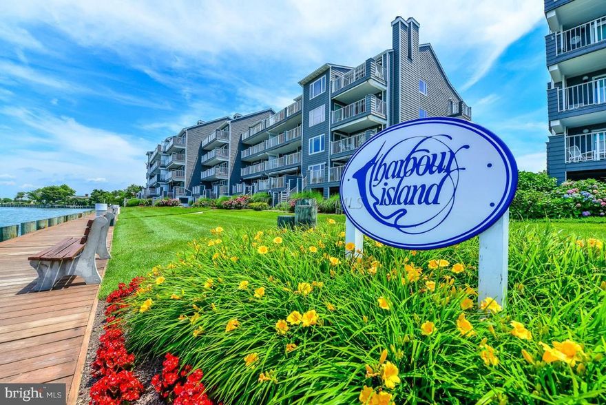 REDUCED! Direct bay front, south end unit with fabulous views! 3 balconies. Brand new stainless kitchen appliances; granite countertops. Wet bar; fireplace; Tile and laminate hardwood flooring. Grand master bath. Lovingly furnished and equipped. $33K+ in rental income yearly. Security, covered parking, lighted tennis courts, pool, restaurant and more.  5 minute walk to the boardwalk.