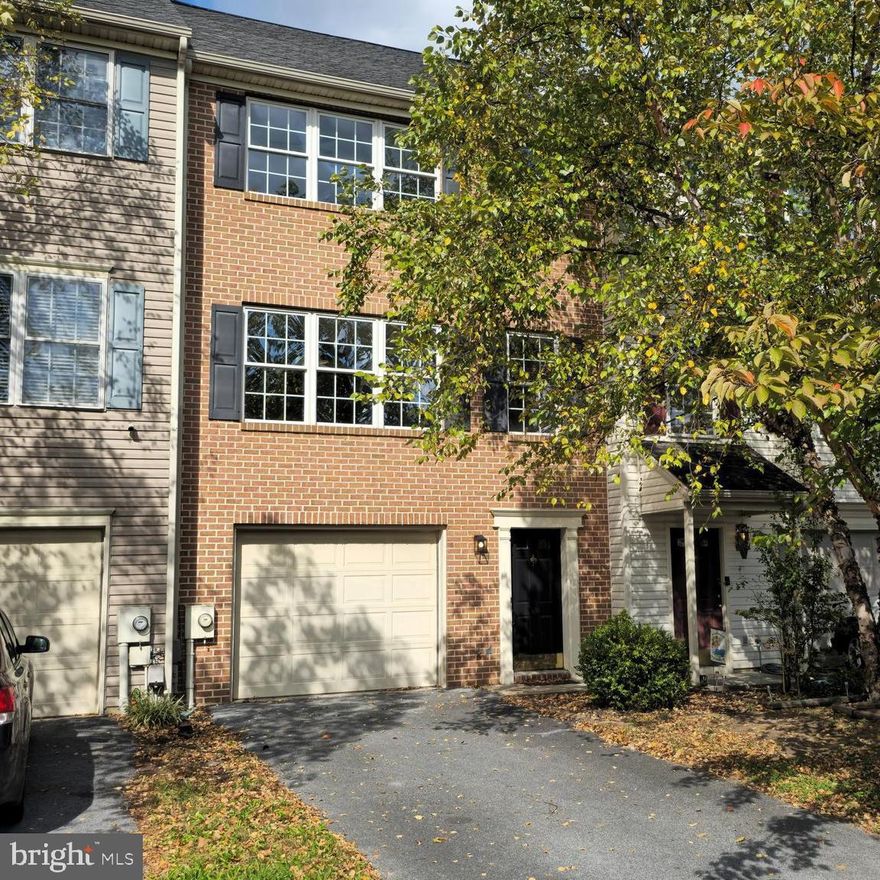 This beautiful three bedroom brick-front townhouse is move-in ready and includes the most wanted features.  A combination of LVP flooring and carpet was installed throughout the home with upgraded granite countertops and a brand new stainless steel appliance package in the kitchen, plus a fresh paint job on every floor.  The main level features an open floorplan that hosts the kitchen with island seating, the large living room, and a separate dining room with easy access to the deck.  The primary bedroom has a walk-in closet, a triple set of windows for great daylighting, and an attached full bathroom for privacy and convenience.  Two other guest bedrooms share a well-sized guest bathroom on the upper level.  Great outdoor amenities put this townhouse over the top - fully fenced at the rear with mature trees for privacy, a freshly stained deck with stairway leading to the yard, and a shaded patio area for quiet enjoyment from the walkout rec room on the entry level.  Enjoy a hassle-free move with a 1-year warranty included, plus a convenient location in Hammonds Mill that is adjacent to the Spring Mills K-12 school compound with local shopping and major commuting routes nearby.  Live in a true community with its own playground, basketball courts, and full access to many of the newest features in Berkeley County.