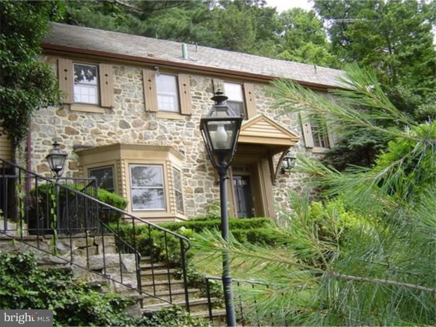 The twenties come back  to life!  Come enjoy the former home of one of  Reading's elite industrialists in a home that stands the grand of time, taste, and location!  Hessian Camp is a  wooded neighbourhood that has you away from the  hustle/bustle of a city, yet is tucked away just a few mins.  from all major city employers, courthouse, sovereign music  center, and restaurants.  All major shopping centers are  just a short drive away as well.  This home has gorgeous flagstone sitting areas, bbq areas, sketching  areas, plus whatever your imagination can dream up.    Lets talk about the home!  A center hall entry  with arched doorways welcomes you to kick off those coat and  shoes after a long day.   Wide plank western red oak peg and groove flooring is original and stunning.   This one has built in corner cabinetry and  original crown molding.  A 400+ sq. ft. family room  complete with bumpout window nook, deep window sills, and  marble fireplace to cozy up to.  Home could be considered  between 4-6 bedrooms, with 3 full bathrooms (1 in master  suite) and a hallway bathroom on 1st floor (considered a  true luxury during its time).  Many of the original  moldings, doors, and hardware remain to keep the look  of a time gone past.  The "walkout" basement is  partially finished adding another 400+ sq ft. of living  area.  Come and see it for yourself, and you will fall in LOVE!