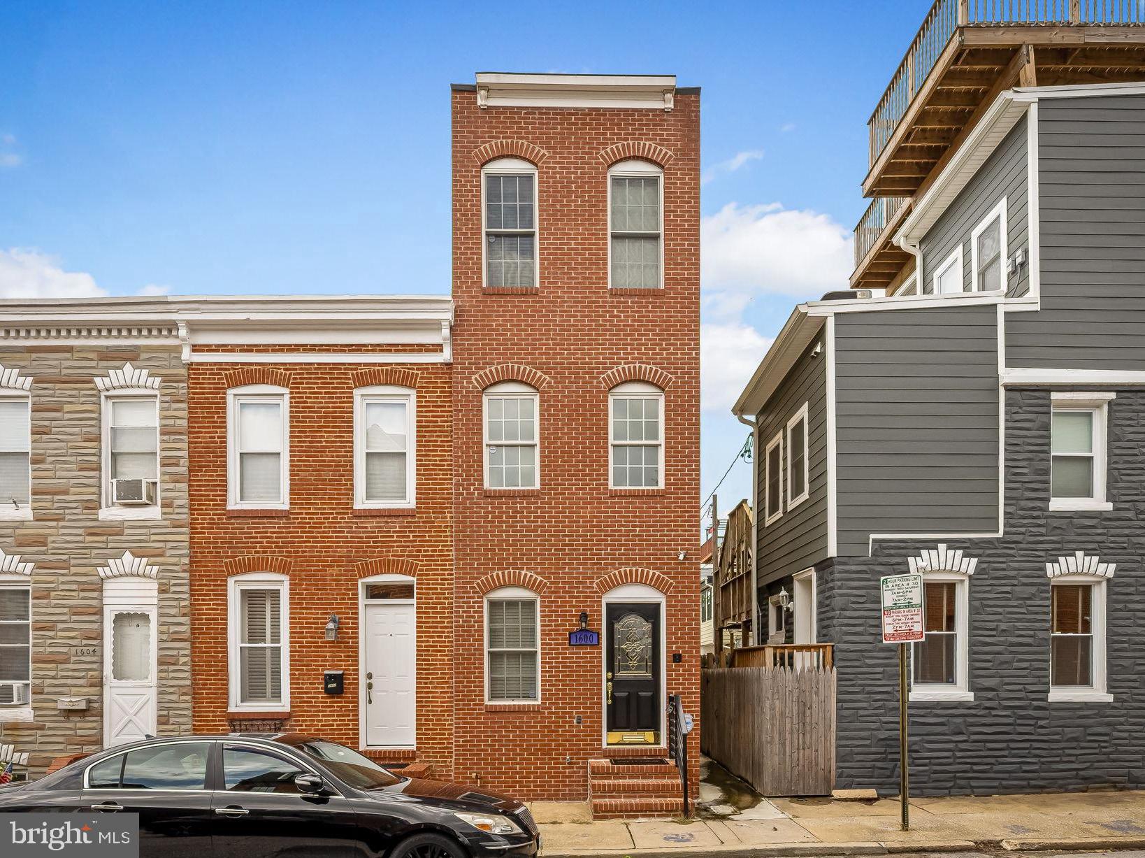 Welcome to your dream home in the heart of South Baltimore! This stunning 3-bedroom, 2.5-bath end-of-group rowhome offers the perfect blend of space, comfort, and modern upgrades. Fully renovated in 2008, this home boasts a rare attached garage, a full basement for additional living and storage space, and dual-zone HVAC for your comfort on every level.
The open-concept main level is ideal for entertaining, while the spacious bedrooms offer plenty of privacy. Enjoy endless hot showers with the on-demand hot water heater, and take your gatherings to the next level on the full footprint rooftop space—a true outdoor oasis with plenty of room to relax, dine, and entertain under the city skyline.
This is the perfect location for experiencing all the great things Baltimore has to offer as well as the closest neighborhood to the new and prestigious Baltimore Peninsula. Close to Riverside Park, Top Golf, M&T Bank Stadium and so much more. You'll be on 95 in just a few short minutes, ideal for commuting. This home combines convenience, luxury, and charm. Don’t miss the opportunity to make it yours!