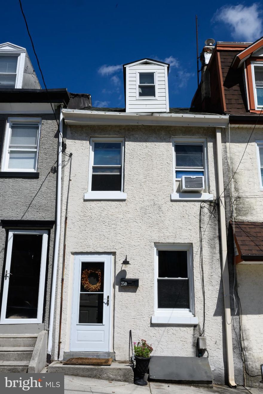 Nestled in the “Chic” Borough of Conshohocken, and ready for immediate occupancy, Welcome Home!  Spacious with tons of character are just a few words to describe this two bedroom one bath and loft, three story stucco over stone row home. Located in the heart of Conshohocken, 250 E 6th Ave is just steps from downtown Conshohocken, and all the hip, charming shops and dining the town has to offer. 250 E 6th Ave is also convenient to the Schuylkill River Trail, public transportation (approximately 40-minute ride into Center City using the Manayunk/Norristown Line Regional Rail) and easy access to major highways such as 476, 76, Turnpike and King of Prussia. This exceptionally maintained home boost new laminate flooring, wall to wall carpeting, newer granite countertops, newer range and oven, also included for your convenience is a refrigerator, washer and dryer. As you step inside, you'll be greeted by a spacious layout that maximizes every inch of its 1,058 square feet. The family or dining room, as the current tenant’s use it, is bright and inviting. This room great for a TV room or Game room, and the next adjacent area, again can again offer flexible choices as it too can be a great TV room, Game Room or Dining room. The Kitchen which has been recently updated, offers plenty of countertop workspace and an abundance of wooden storage cabinetry. Connected to the kitchen, the informal breakfast bar makes a great spot for those quick on the go meals. Adjacent the main floor laundry adds a touch of convenience, making daily living effortless. The fenced back yard is accessed just past the breakfast bar, and offers a covered patio, making it a spot for the gas/charcoal grill and a spot to enjoy all year long.  The second floor offers the bedrooms, both of which have wall to wall carpeting, and decent closet space. These two rooms are serviced by a full hall bath. Lastly up one more level, the third floor loft provides additional flexible space for storage, exercise or even a spot for the futon for those occasional overnight guests (please note this space is not heated). Look no further, schedule a home tour today and see why 250 E 6th is your Best Choice! Please Note: First, Last and Security get you in the door. Landlord may consider up to two pets for an additional  one time fee  of $150.00 (restrictions may apply) Tenants are responsible for all utilities which include gas, electric, water, sewer, tenant also responsible for snow, lawn care, and tenant insurance. Tenants should expect to place all utilities in their name