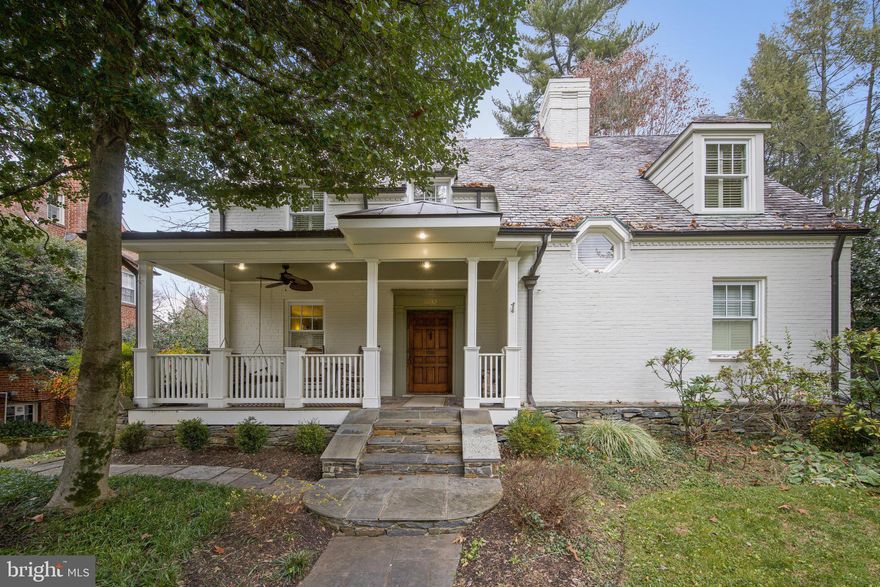 Classic Barnaby Woods Colonial exquisitely expanded to over 6000sf of interior living space, sitting on one of the largest lots in the neighborhood with a creek along the back of the property line.  The current owners created a perfect blend of original character with tasteful updates to complement all the original details in the home.  Relaxing front porch perfect for sipping lemonade on spring evenings, entry foyer with coat closet & wainscoting lead to the spacious living room with wood burning fireplace and french doors to the dining room big enough for large holiday gatherings with family and friends.  From the foyer, french doors lead to an  office with built-in bookcases and powder room.  The kitchen is a true chef's and entertainer's delight with stainless steel appliances and farm sink, large center island with seating for 6, Ann Sacks backsplash, copious amount of cabinets, separate pantry and a nook with a desk, adjoining the kitchen is a large family room overlooking the backyard.  Built-in speaker system in the Great room, kitchen, dining room, back porch, studio/fitness room.  A mudroom is located just off the kitchen for coats, backpacks, sports equipment and more.  The second floor features four bedrooms and three bathrooms including a primary suite with a large bedroom, sitting/dressing area with 2 walk-in closets & linen closet which leads to the primary bath with double vanity, Ann Sacks floor and backsplash tile, freestanding soaking tub, separate shower and private powder room.  The first of 2 laundry rooms is on this level with  a front loading washer and located across from the linen closet.  The lower level is large and has a very versatile layout to meet your needs - rec room with fireplace and built-ins, wine cellar, full bath, bedroom with 2 walk-in closets, an additional room currently used as a gym but could also be a bedroom or office or playroom.  The original laundry room is on this level along with the garage and LARGE storage space.  The backyard is a paradise for young explorers with a treehouse & creek providing endless hours of fun.