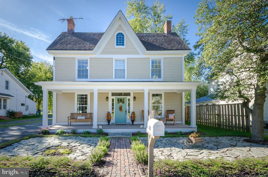 Be prepared to be CHARMED!!! This farmhouse was originally built in 1831 and beautifully updated over the years to preserve the original charm while providing modern amenities and class, including the claw foot tubs, recycled glass counter tops, granite appliances, built-ins, ! If you aren't totally captivated by the front porch, just wait until you step inside this nearly 2,100 sq ft 3 bedroom, 2 full bath home on almost a 1/3 acre lot right in town with a paved driveway! Yes, walking distance to restaurants, shopping, distillery and the new ice cream shop (coming soon!) Or stay in and enjoy a quiet evening on your choice of either the screened in porch, deck or by the fire pit in the backyard.  If you are looking for a special home, the one that will oooh and ahhhh all of your guests, feels like part home part fairy tale....allow me to welcome you to 410 Main St.! Are you ready to make THE SHORE HOME? Say YES to the address!  Zoned as Stevensville Historic Village Center allows for at home businesses and possible commercial opportunities - buyer to confirm with QAC Planning & Zoning. NEW siding on the front, blown in insulation, roof 2012, windows 2010, hvac 2012