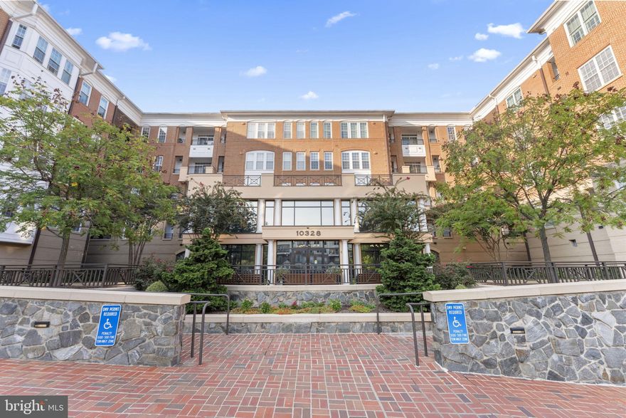 Discover urban living at its finest in this beautiful 2-bedroom, 2-bathroom unit in the heart of Fairfax City. Just 20 minutes from DC, this home is ideally located within walking distance of shopping, restaurants, and coffee shops, with easy access to major commuter routes. Inside, enjoy a cozy gas fireplace, a stylish kitchen with stainless steel appliances, and a luxurious primary bathroom with a soaking tub and separate shower. The unit also features a washer and dryer, extra storage in the garage, and 2 assigned parking spaces in a covered garage. Residents can also take advantage of a welcoming lobby and two fitness centers. This is the one!