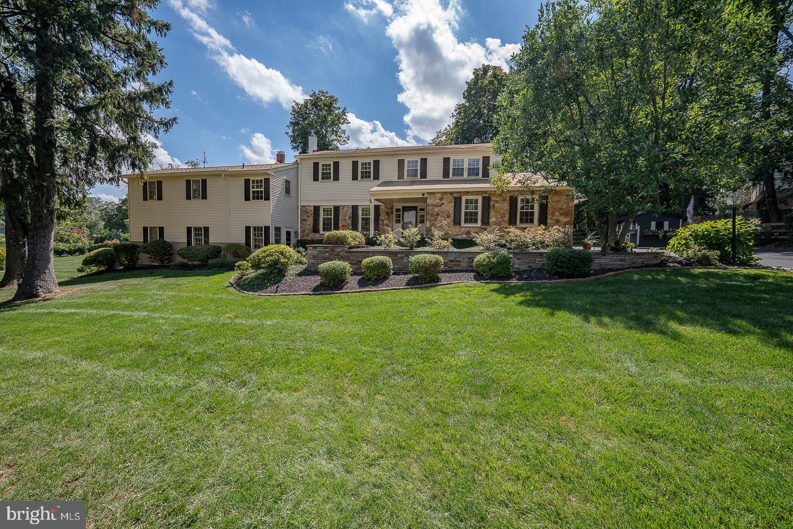 Welcome to 681 Fernfield Circle! This wonderful 5 Bedroom and 3.5 Bathroom home is tucked away on a quiet cul de sac in one of Wayne's most desirable neighborhoods. Set on a beautiful lot within the award winning Tredyffrin Easttown School District, this property combines classic charm with modern updates. Its prime location is just minutes from the train, shopping and dining with easy access to all major routes. Step inside to find a sun filled interior with hardwood floors, a welcoming formal Living and Dining Room. The updated Kitchen offers off white cabinetry and workspace, tile backsplash, granite countertops, stainless appliances, recessed lights offering both style and functionality. There is also a slider onto the Patio. Step down to the handsome Family Room with built-ins, stone fireplace and French Doors opening to a flagstone Patio with a pathway leading to the Deck. Off the Family Room is the Powder Room, Laundry area with a door to a 2 Car Garage. The separate Shed adds extra space for tools, bikes and outdoor equipment. Upstairs, the spacious Primary Suite offers a private retreat with en suite Bathroom and walk in closet. Three additional Bedrooms and a well- appointed Hall Bath complete the second level. One of the stand out features is a thoughtfully added " in law" Suite that provides two spacious living areas with a slider to a large Deck overlooking the side yard, Kitchen area, a separate Bedroom, full Bathroom, walk in closet and a private entry offering ultimate comfort and privacy for extended stays, or long term family use or even for an Au Pair Suite. The spacious finished Basement has plenty of areas to play or work and includes a utility room ideal for storage. Hardwood floors throughout much of the home, multiple updates, and a thoughtful layout make this property move -in ready. The outdoors spaces , Patio, Deck and a generous yard offer room for relaxing, gardening or playing. 681 Fernfiled Circle is more than just a house, it's a home designed for today's lifestyle. With its wonderful setting, versatile spaces and unbeatable location, this property is a rare find in a highly sought after Wayne community. Welcome Home!
