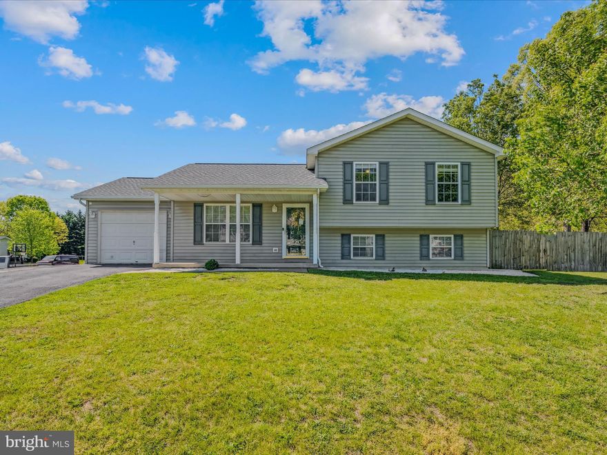 Enjoy this well-maintained home on one of the neighborhood's largest lots. It's ready for summer with a new deck, hardscaping, and an above-ground pool. The spacious main level features an open floor plan with a spacious kitchen/dining area with a vaulted ceiling and exposed beam.
<br><br>
This split-level home features three bedrooms and a full bath on the upper level. The lower level has two adjoining rooms that can be used as a primary suite, or as a family room, exercise room, home office-- the possibilities are endless. A large full bath makes it a convenient and functional space for whatever your heart desires. 
<br><br>
The current owners have put a lot of love into the home. The back sliding glass door has been replaced with beautiful French doors that lead out to a new deck. Solar lights provide illumination for nighttime cookouts, or a dip in the above-ground pool. Extensive hardscaping means that there's less maintenance in the back, and you can even grow your own veggies this summer in the raised garden bed. 
<br><br>
Updates and upgrades include:
- HVAC 2016
- Roof 2018
- Appliances 2018, Built-in Microwave 2020, Washer and Dryer 2023
- New main-level and lower level flooring 2023
- Updated bathrooms 2023
- Above-ground pool 2023
- Deck and hardscaping 2024