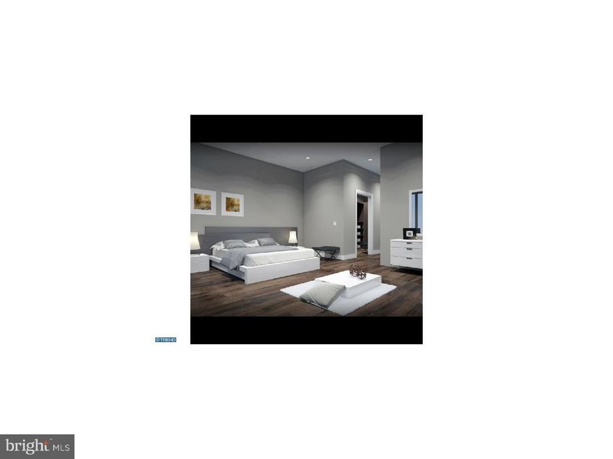 Discover the perfect blend of luxury, style and comfort at the Walnut Estates. Scheduled for completion at the end of the year and one of 5 in a gated community, this 19' wide, 5,000 square foot home with 2 car garage features 4 light filled bedrooms, 4 full bathrooms, 2 half bathrooms and includes a variety of luxury finishes such as hardwood flooring, built in speakers, solid core interior doors, video intercom system, home automation system, elevator and dual zoned HVAC system. The home showcases comfort & style from start to finish, starting with its tiled foyer and spacious first floor bedroom, up to the second floor which features a gorgeous dining room with ceilings that soar over 20' high, just the spot to sit down for a meal with family and friends. The dining room leads into the spacious living room with 10' high ceilings, built in speakers, wet bar, a gas fireplace and large windows leading out to a rear deck. Continue past the conveniently located powder room into the modern, stylish kitchen with all the bells and whistles you could ask for, such as top of the line stainless steel appliances, custom cabinetry with under cabinet lighting and gorgeous quartz or granite counters with a large island. Upstairs, the 2 bedrooms, laundry room, family room and tiled hall bath on the 3rd floor are a treat, but the 4th floor master suite is a work of art with its huge walk in closets, large deck, and master bath with radiant heated floors, private toilet room and custom tiled shower with dual shower heads, raincan ceiling and handheld showerheads, all within a frameless glass enclosure. From the master suite be sure to head up to the pilot house with sitting area and optional wet bar, and onto the spacious roof deck which offers stunning views of the city. The full finished basement completes this stunning home, which includes a fantastic media room with ceilings over 9' high, wall to wall carpeting, conveniently located powder room and optional wine cellar. Located in the highly desirable Rittenhouse Square area, the home has a 10 year tax abatement pending.