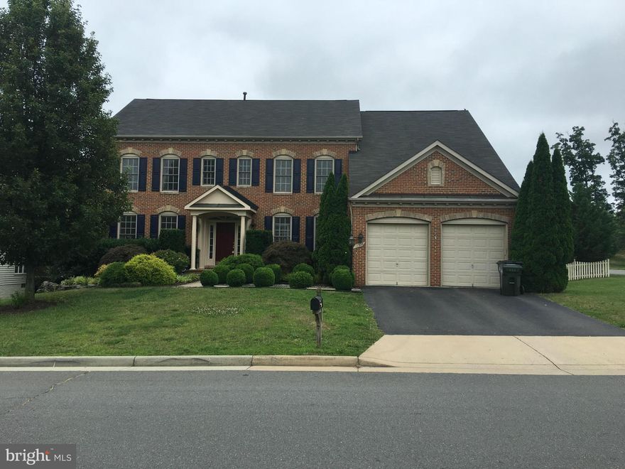 PRICE REDUCED $20,000! Spacious brick front home. Features two story foyer. 1st floor hardwood. Living room with fireplace. Gourmet kitchen with center island. Upper level features 4 bedrooms and 3 full baths, Luxurious master suite. Fully finished basement with full bath and 1 bedroom. Please  send offer and refer questions to alternative agent "Torialai Bahadery"