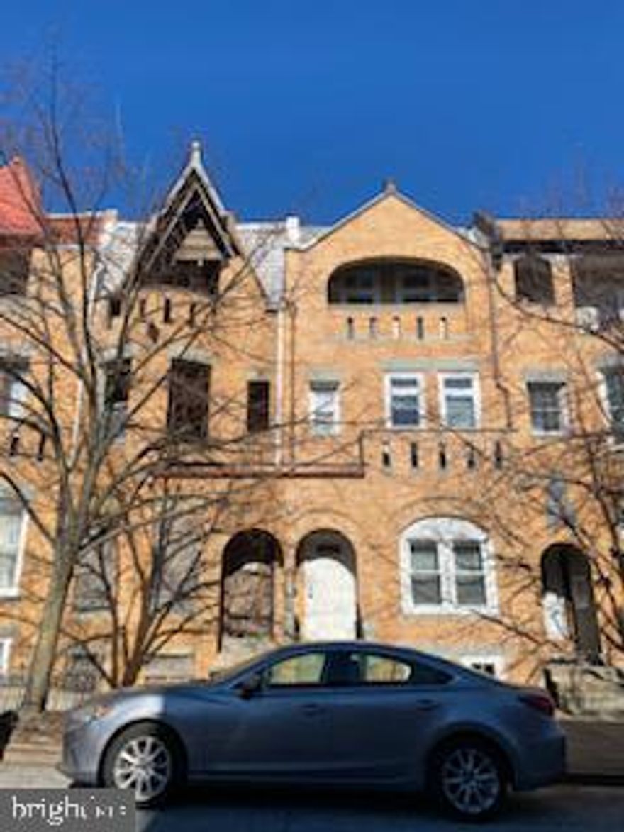 Welcome to historic Reservoir Hill! A unique opportunity for an investor or homeowner to build the home of your dreams! The property is being sold as a shell. Current framing is started for a 3-unit property. Continue with this or convert back to a grand single family. Plans for 3 unit convey. Plans include 1-3 bedroom units and 2-2 bedroom units.