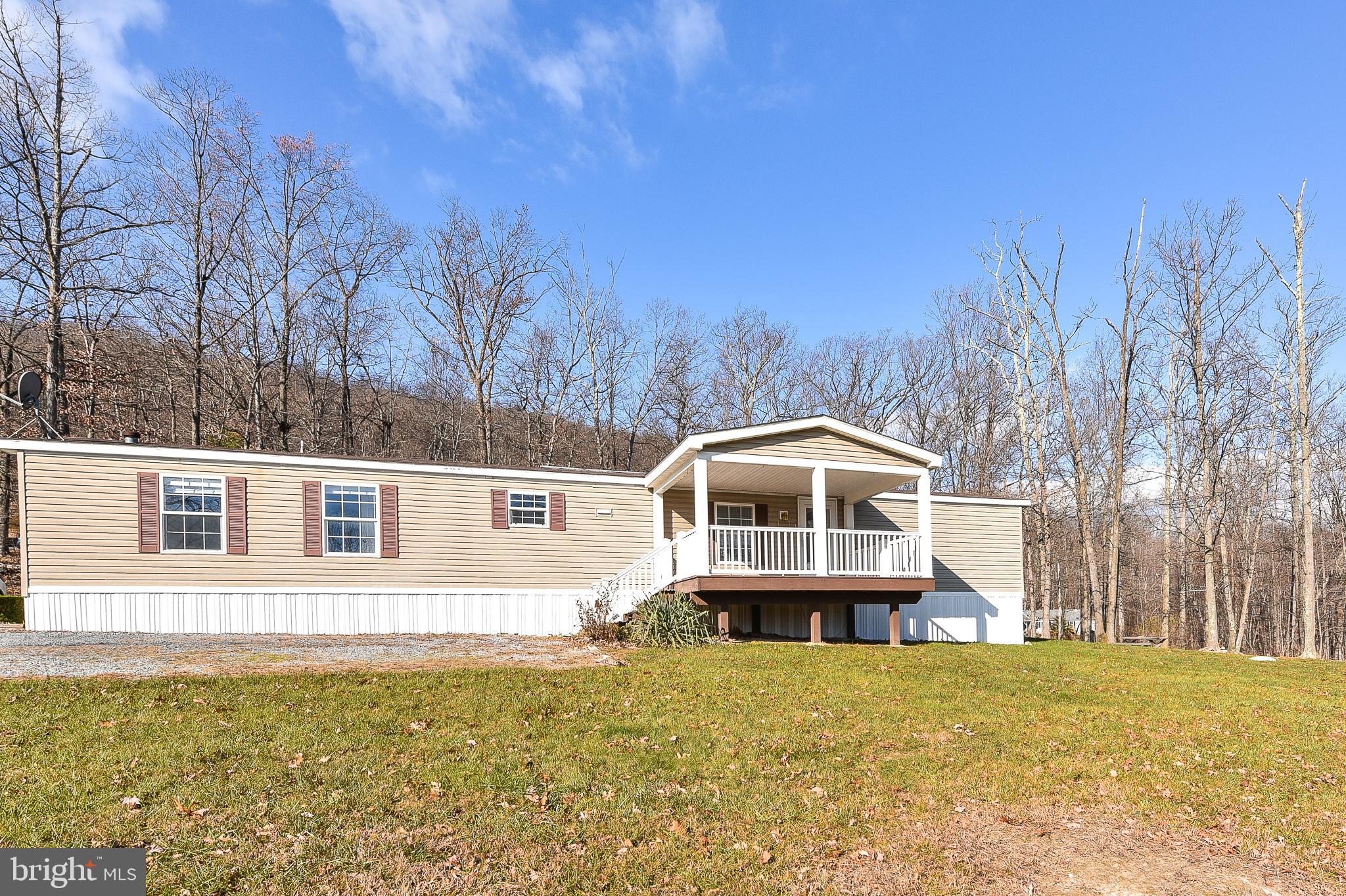 Welcome to this well-maintained 2001 Redman manufactured home featuring 2 bedrooms and 2 bathrooms, offering comfort, updates, and a serene setting on 2.44 acres! This home is move-in ready and packed with modern conveniences.
Key features include an updated HVAC heat pump system installed in July 2021, a new water filtration system added in March 2021. The home has been thoughtfully updated throughout, including new flooring in the kitchen and laundry room (December 2024), fresh paint throughout (December 2024), and a renovated kitchen with new countertops and sink (December 2024).
The kitchen boasts GE stainless steel appliances, including a glass-top stove (2023), a dishwasher (2023), and a refrigerator with an ice maker (2024). A new GE clothes washer was added in 2020, ensuring all major appliances are in excellent condition.
Outside the covered front porch is perfect for relaxing and enjoying the peaceful surroundings.
Situated on over two acres, this property provides plenty of space for outdoor enjoyment while offering the tranquility of country living.
Don’t miss your chance to own this beautifully updated home. Schedule your showing today!