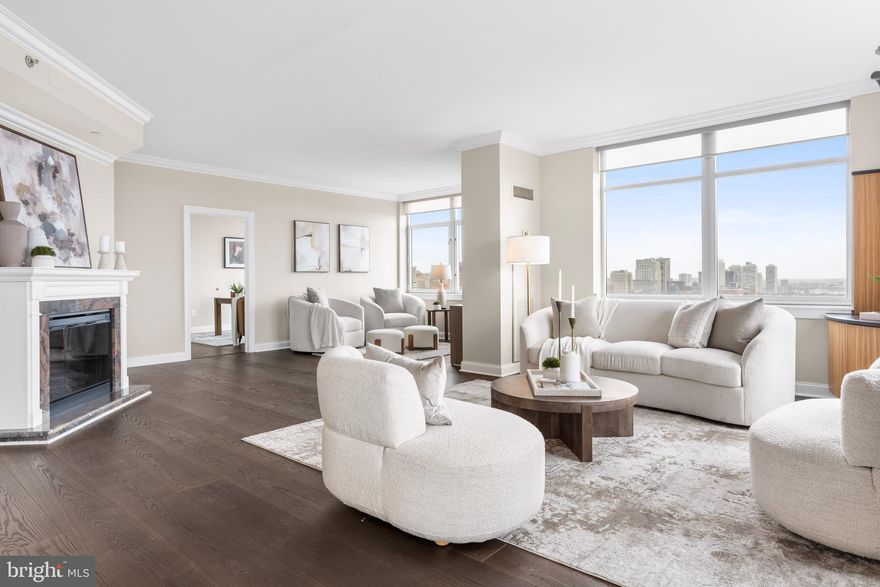 There is only one Suite 1808 and it is extraordinary.  Commanding the 18th floor of the southeast corner of famed Symphony House, this sprawling 2,395 s.f. Mozart Luxury Suite is ideal for the discerning urban dweller who refuses to sacrifice beauty to functionality.   The smart open-concept floor plan is expansive, boasting 270 degree panoramic river, bridge, and Avenue vistas.  Gorgeous wide-plank hardwood floors, electronic shades, architectural crown molding, and custom-built focal features elevate the main live space. Unique in many ways and one of only a rare three at Symphony House, the Mozart Luxury Suite's layout offers tremendous versatility. Adjacent to the main live space in this expanded corner floor plan, a beautiful light-filled room with floor to ceiling windows overlooking the Avenue and unimpeded tree-lined views to the river.  Whether third bedroom, home office, den, cool quarters for overnight little ones, or a seamless continuation of flow for entertaining, this beautiful room has endless possibilities.  An expertly-fitted urban galley kitchen features granite countertops, Viking professional stainless appliances, custom cabinetry, and wine chiller.  The dine space is flanked by floor to ceiling windows framing spectacular city and sunset views.  Step outside to a private sunlit balcony to enjoy a morning coffee or midnight glass of wine.  A key attribute of this very desirable layout is the privacy of each bedroom suite.  A zen haven unto itself, the primary suite is a quiet oasis of luxury with bright, eastern-facing floor to ceiling windows anchoring this magnificent space.  Two oversized walk-in closets, a cozy sitting area, and focal fireplace with built-in shelving highlight the suite. An elegant white marble bath boasts dual vanity, a soak tub, and double-wide glass-enclosed shower. This primary suite is a simply spectacular sanctuary, offered exclusively in the Mozart. At the opposite wing of the residence, the perfect guest suite replete with walk-in closet, linen, and lovely en-suite marble bath. A modern half bath with custom wallpaper completes this stunning residence. Freshly painted a neutral revere pewter, new bedroom carpeting, completely move-in ready.  There is only one Suite 1808.  And it is extraordinary. Two garage spaces in the building's private garage and two storage lockers are included with the residence. Offering unparalleled services and amenities, prestigious Symphony House is the city's premier Avenue of the Arts address boasting 24/7 concierge and doorman, 65' heated indoor lap pool, steam and sauna, state-of-the-art fitness center, bike share, beautiful outdoor terraces, library, clubroom, dining salons, wine cellar and chef's catering facility. Stellar location, ideally situated amid the city's vibrant theatre district, steps from the finest restaurants, boutique shopping, recreation, major travel routes, the dynamic city lifestyle at your front door.  A hallmark destination, Symphony House continues to enjoy incredible stability, and its well-earned status as one of the most prestigious buildings in the city. A rare gem on the Avenue.