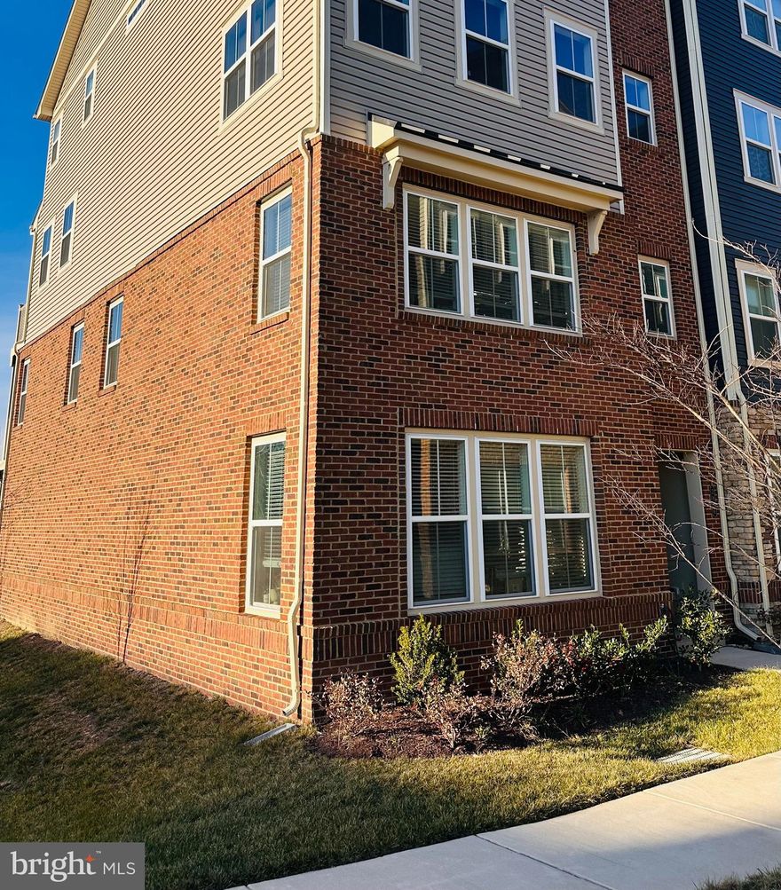 This charming end-of-row townhouse in the desirable Parkside community offers a perfect blend of modern comfort and inviting warmth. Built in 2022, the contemporary design features an open floor plan, ideal for gatherings. The gourmet kitchen boasts upgraded countertops, upgraded cabinets, a can pantry and stainless steel appliances, while the family room flows seamlessly for easy entertaining. All the closets are outfitted with custom Closet America Systems. On the upper level enjoy two spacious bedrooms including a primary suite with a luxurious bath and walk-in closet.  The loft on the second level is great additional space for an office or a guest room which steps outside to a balcony, perfect for morning coffee or evening relaxation.  This home is an end unit boosting extra windows and privacy. The community amenities include a refreshing outdoor pool and well-maintained common grounds, fostering a sense of connection among neighbors. Conveniently situated near schools, parks, and essential public services, this home is a true gem in a vibrant neighborhood. Experience the comfort and community spirit that awaits you!