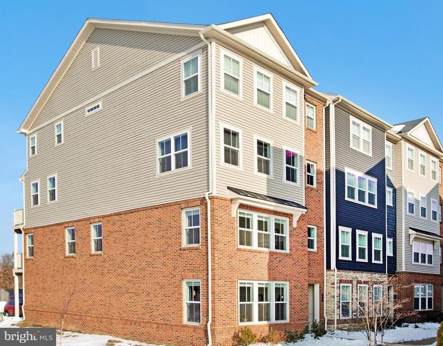 This charming end-of-row townhouse in the desirable Parkside community offers a perfect blend of modern comfort and inviting warmth. Built in 2022, the contemporary design features an open floor plan, ideal for gatherings. The gourmet kitchen boasts upgraded countertops, upgraded cabinets, a can pantry, stainless steel appliances, and a gas range; while the family room flows seamlessly for easy entertaining. All the closets are outfitted with custom Closet America Systems. On the upper level enjoy two spacious bedrooms including a primary suite with a luxurious bath and walk-in closet.  The loft on the second level is great additional space for an office or a guest room which steps outside to a balcony, perfect for morning coffee or evening relaxation.  This home is an end unit boosting extra windows and privacy. The one car garage and driveway parking makes entry and exit a breeze.  The community amenities include a refreshing outdoor pool and well-maintained common grounds, fostering a sense of connection among neighbors. Conveniently situated near schools, parks, and essential public services, this home is a true gem in a vibrant neighborhood. Experience the comfort and community spirit that awaits you!