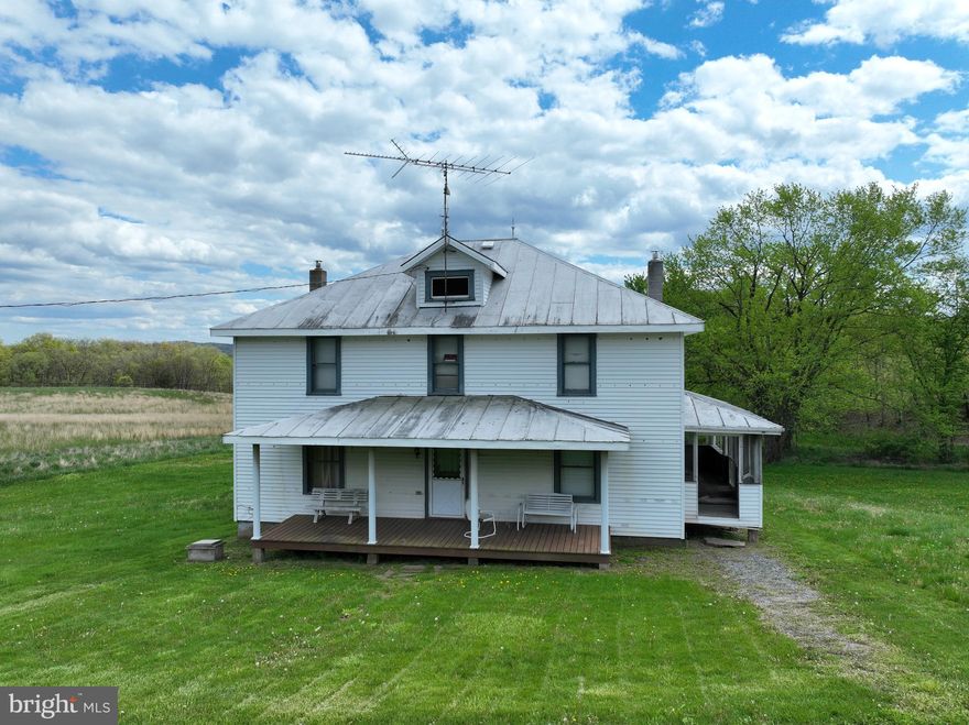 Centuries-old farm seeks a determined new owner to breathe life back into this timeless treasure. Spread across 22.10 acres, this farm features beautiful pasture fields, dense woods with multiple ponds, all located in the heart of Hampshire County, WV just off Jersey Mountain Road and under 2 hours to the DMV. Dive into the rugged beauty of the great outdoors as you explore the vast pasture fields that stretch across the landscape. Whether you envision raising livestock, cultivating crops, or simply relishing the freedom of wide-open spaces, this property offers endless opportunities for those who crave independence. Lose yourself in the untamed beauty of the dense woods that insulate this property, providing a haven for wildlife and endless possibilities for hunting. Multiple ponds dot the terrain, providing a key water source for livestock or simply a place to unwind in nature's embrace. The centerpiece of the property is a vintage West Virginia Farmhouse containing a whopping 6 bedrooms and over 2,300 sq. ft. This property offers a blank canvas for restoring this days-gone-by treasure. Whether you dream of building your own homestead, embarking on outdoor escapades, or simply reveling in the freedom of wide-open spaces, this property offers everything you need to make your dreams a reality. Don't let this Hampshire County haven slip through your fingers—claim your slice of rural paradise in the mountains of West Virginia!
