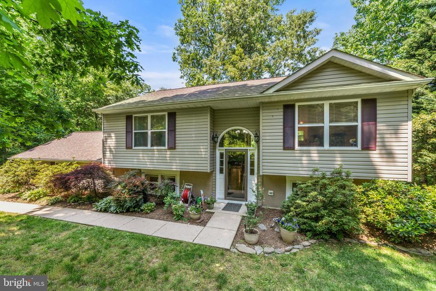 Welcome to the lake - WATERFRONT 4 bed 2 bath  home with dock - fabulous views - two-tier decking - mature trees and plantings - all new exterior doors - new paint - new appliances 2020 -  custom cabinets - new sliding glass doors 2019 - new roof and skylights 2019 - granite countertops - new Trane HVAC system 2019 - updated bathrooms - power washed and painted deck 2022 - new water heater 2019 - new door hardware 2022 - new flooring 2020 - wood floors - carpets cleaned 2022 - new whole house carbon water filter 2022 - 2-car side load garage - cul-de-sac street - privacy trees - private and tranquil setting - this home has been wonderfully maintained - call with questions or schedule a showing today