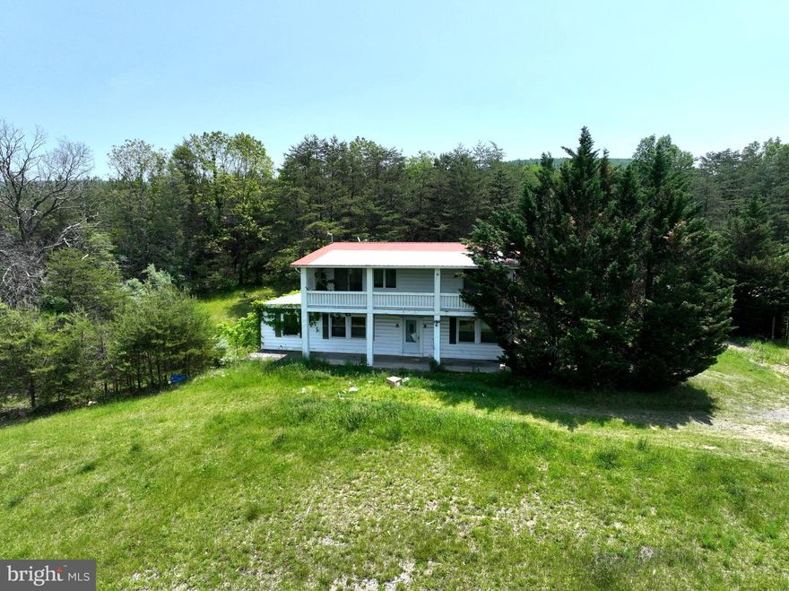 Amazing 20 acre property, unrestricted, beautiful views!   A little elbow grease brings this statuesque home back to shining & new and some bonus sweat equity!