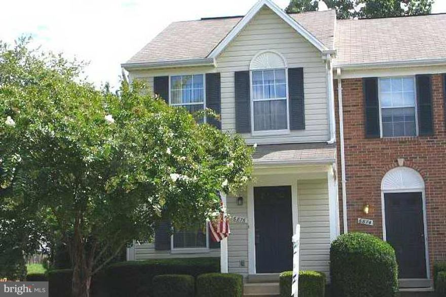 A must see!! Fresh paint, updated flooring to include beautiful hardwood floors on main lvl. Gourmet kit w/ granite counters, stainless steel appliances, & back splash. Space for table in kit & walk out to huge deck w/ private views. Large basement w/ bathroom, recessed lights, full size laundry, & walkout to patio & fenced yard. Walk to community pool an just minutes to shops and restaurants.