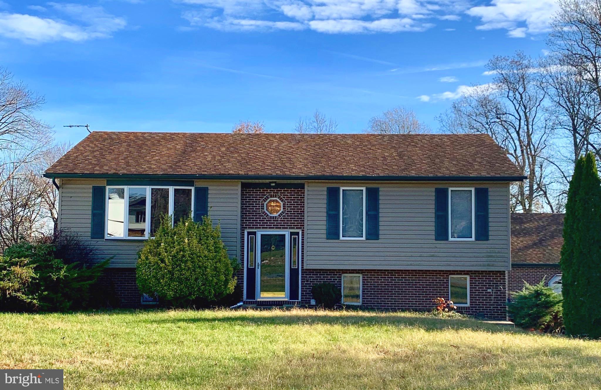 Located in Arundel and close to Elk River... Features detached 2-car garage, storage shed, finished lower level family room with pellet stove, deck and in-ground pool.