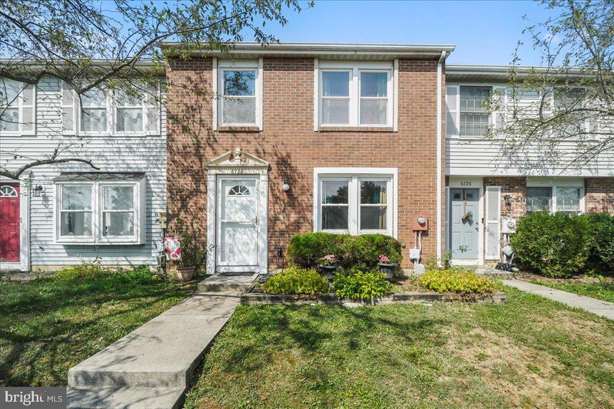 Walkway graced with flowers welcomes you into this impressive townhome complete with brick facade.  The natural light shows off the wood floors that continues up the steps to the second floor.
Plenty of cabinets in the kitchen which offers table space and extra cabinets. Nice size family room and a second room gives you the choice to have an additional area to relax, entertain or will it be a dining room? Open the back door to a deck complimented with gardens and a fenced yard and shed.  A powder room completes the first floor and yes there is a washer and dryer!  Let's go upstairs and check out the three bedrooms and two full baths. Primary has lots of room, closet space,  windows and a private full bath. The second and third bedrooms are roomy ready to move in.
Great location for shopping, commuting -easy to show.