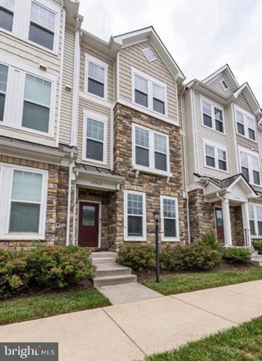 Beautiful interior townhome in top shape. Highly sought-after community of Brambleton! This 2 car garage home is well appointed with upgrades throughout. Beautiful kitchen with custom backsplash, stainless steel appliances, gas cooktop with custom hood, and double wall oven! Off of the kitchen is a large deck - perfect for entertaining. The owner's suite upstairs is light-filled with a tray ceiling! 2 secondary bedrooms with secondary bath. Rear load 2 car garage and ample street parking. HOA amenities include high speed internet, and basic cable TV paid by the owner. 5 pools and walking trails Do not miss this opportunity! Check this home out today!