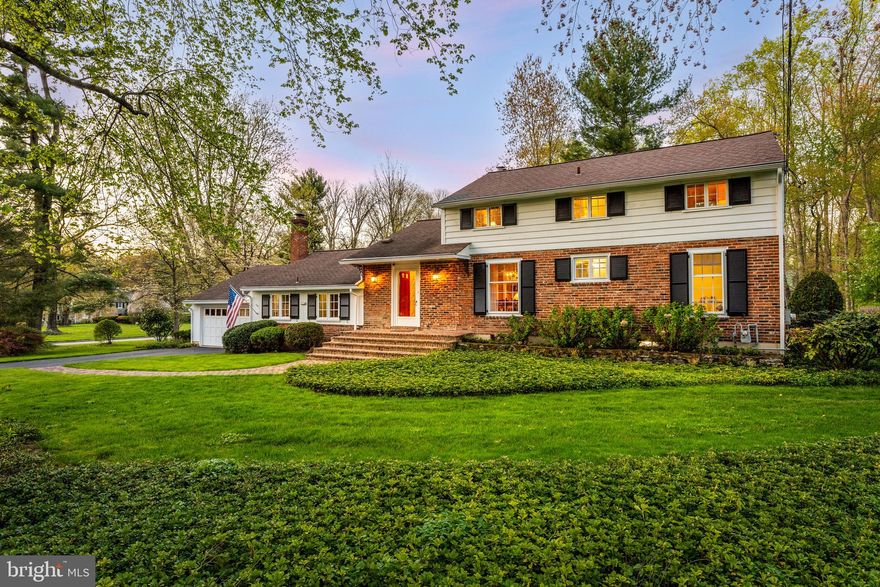 Enchanting garden cottage at the pristine and quiet intersection of Woodleave and Great Springs in highly sought after North Bryn Mawr. Exquisite gardens with flagstone terrace are punctuated by a glistening pool. An utterly charming interior echoes the spectacular setting with cathedral ceilings, exposed beams, wood floors, two fireplaces, large windows, built-in shelves and even such finishes as a dutch door to the garden. A first floor master makes this a rare downsizer opportunity. Enter the center hall foyer and step left down to the kitchen, which is part of a great room with 14ft+ cathedral ceiling, exposed brick detail, skylights and exposed beams. This room includes cozy family room seating with a fireplace and a door to the gardens. To the right of the foyer is a dining area overlooking the lush front lawn and finished with built-in shelves. The dining area opens to the living room with a fireplace and panoramic view of the garden. This room also features beautiful exposed beams and walks out to the backyard. A first floor master with ensuite bath features a separate office/dressing room space and ample built-in storage. Upstairs, two additional bedrooms with generous closet space share a hall bath. A powder room with a designer touch is off the foyer. The finished basement provides extra space for home office, gym or recreation. The two car garage has a large garden shed with separate access in back. This home is a beautiful oasis in a beloved location. Extremely central making it a commuter’s dream. Close to shops, restaurants, parks, schools, clubs, trains and easy access to all major roadways. Award winning Lower Merion school district.