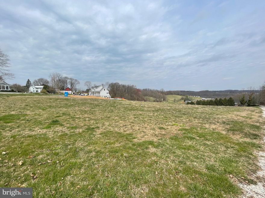 1.43 acres available to build a 3 BEDROOM home.  RURAL with a view, private with a view.  Excellent SCHOOLS.... BUILD YOUR DREAM HOME...    HURRY!! 
Buyer to drill well & perc. Home requires SAND MOUND septic.
