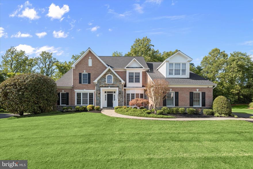Welcome home to 16907 Harbour Town Drive in Ashton’s amenity-rich Hampshire Greens. Built by Craftmark Homes and elegantly situated on the 6th hole of this distinguished golf course community, nearly 8,200 square feet of luxury living space await along with a main-level primary suite - undoubtedly the best value in the area. With sweeping golf course vistas from nearly every rear window and a dramatic two-story foyer, this property makes an immediate statement. Main level highlights include hardwood flooring, custom built-in shelving, crown moulding, multiple large-scale bay windows, and access to the three-car garage. The gas fireplace and wall of windows overlooking the fairway anchor the living room, while the chef’s kitchen boasts oak cabinetry, stainless steel appliances, and granite countertops. The main-level primary suite enjoys its own gas fireplace, bay window, two expansive walk-in closets, and a luxurious primary bath. 

The upper level presents a palatial guest suite as well as two additional secondary bedrooms and bathrooms. The lower level is your entertainment hub complete with an enormous recreation room, wood-burning heater, and a kitchenette. The flex room provides the perfect space for a custom gym or theater room. You’ll also find a convenient storage area and full bathroom located downstairs. Hampshire Greens residents enjoy world-class amenities including top-tier golf, an elegant clubhouse, playgrounds, walking/biking trails, and easy access to all major Baltimore/DC commuter routes. Don’t let this sophisticated Montgomery County property pass you by.