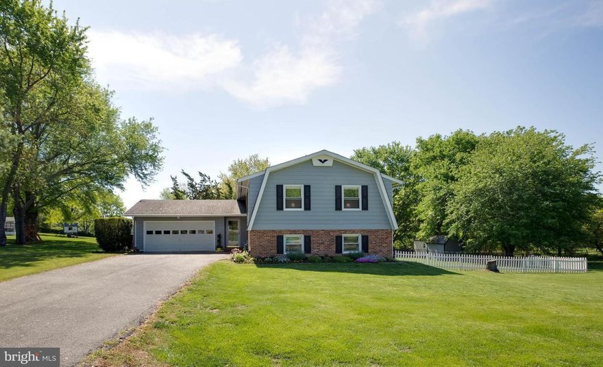 $ REDUCED - Stunning, immaculate, move-in ready home.  Convenient location yet with peaceful privacy.  Relax in your fenced yard with deck and shaded pergola.  Enjoy your morning coffee in your two-story sun room.  Cook in your gorgeous custom kitchen with gourmet gas stove, stainless appliances and unique backsplash.  All baths remodeled with beautiful vanities and finishes.  Approx 1850 sq ft.