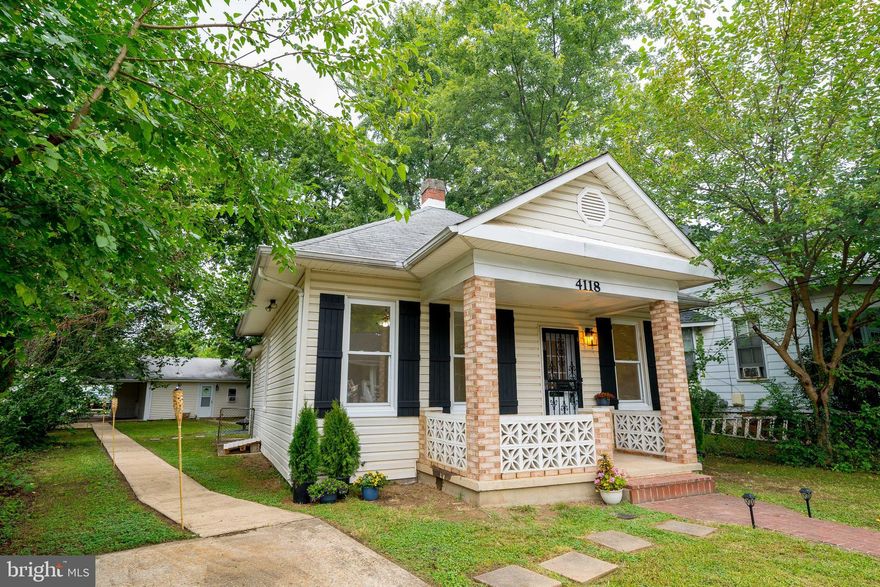 HUGE PRICE UPDATE**Recently renovated home with Open floor plan**Brand new HV/AC system, new hot water heater*Updated Flooring and lighting**One fully renovated bathroom in Main house and three spacious bedrooms**Property has second building at rear that offers a 2nd Fully renovated bathroom and large open studio space for bedroom number 4**2nd building at rear is perfect for a rental income producing property**Property also has a driveway at front of home and 2nd driveway at rear for private access to rear building**This is a super rare find and won't last long**