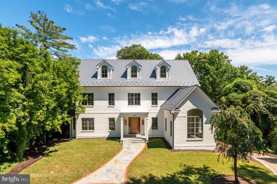 New construction by HDBuilds on just under a 1/3 of an acre on a charming and sought-after cul-de-sac in Spring Valley! Incredible scale on four levels, designer details, Thermador Kitchen Appliances, and Waterworks fixtures throughout. Lux Primary Suite with sitting room, fireplace, dry bar w/ fridge, and balcony. 2nd Kitchen w/ Bosch appliances in the Lower Level. Rear screen porch with fireplace overlooks the serene private rear garden with mature trees and landscaping. 2-car garage parking + driveway for additional parking. Two laundry rooms. Elevator to all 4 levels.  Amazing views and vistas from oversized windows overlooking Spring Valley!