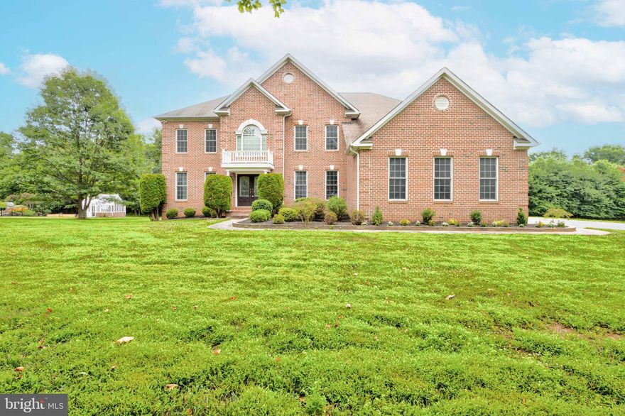 Magnificent brick custom home on 1 acre lot with 3 car garage for rent in Archers Glen, HoCo Sykesville! There's over 5500SF of finished space on main & upper. Hardwoods throughout main level; main level has a study with wooded views; gourmet kitchen with stainless appliances & granite countertops; spacious 2 story family room; upstairs has 4 spacious bedrooms total with 3 full baths; basement is fully finished with a full bath & a bonus room for multiple uses. Freshly painted and new carpet just installed.  Landlord requires minimum 700 credit score and strong income reference.  There is a small storage room in LL and it is being used for owner's furniture.