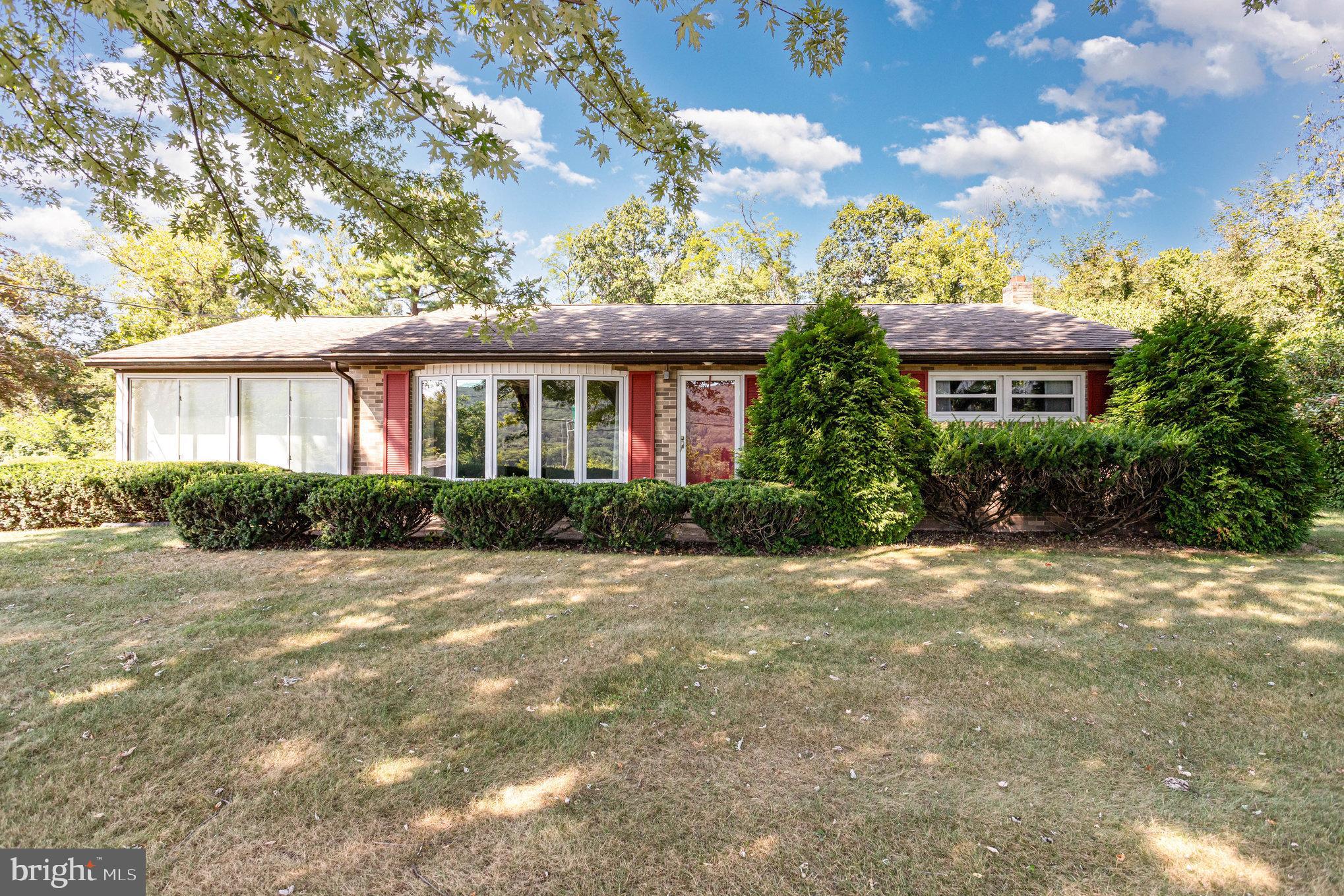 A perfect place to call home! This magnificently maintained brick ranch, with extra living quarters, is situated in Middle Paxton Township, Central Dauphin School District. The main floor features the warmth and comfort of the formal living room with wall-to-wall carpet, guest closet, and a large picture window for lots of natural lighting. The well laid out kitchen offers cherry wood cabinets, corian countertops and backsplash, double basin sink, appliance package to remain, windows, and a door leading to the Florida Room. The light-infused Florida Room offers wall-to-wall carpet, ceiling fan with light, and lots of large windows. The main floor also features two great-sized bedrooms with large closets and easy access to the main bathroom with a tub/shower combo. The lower level features a family room with wall-to-wall carpet, ceiling lights, and a bar. The lower level also offers a laundry room/storage room with a washer, dryer, shower stall, sink, workbench, and a door leading outside. This home also features an oversized two car garage with laundry room, storage room and living quarters. The second-floor extra living quarters feature a kitchen, living room, two bedrooms and a full bathroom. With many updates, endless views of the mountain/river and a great indoor/outdoor flow truly make this a wonderful place to live.