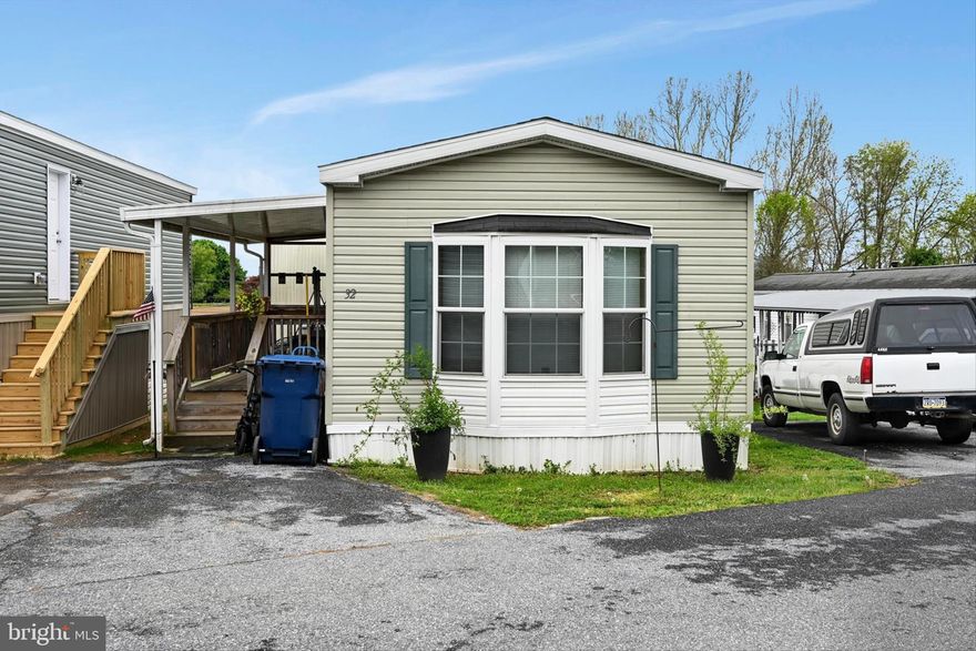 Welcome home to this refreshed 3-bedroom, 2-bath manufactured home that’s easy to love from the moment you walk in.

Fresh brand-new carpet (just 3 months old) runs throughout the entire home, giving it a clean and updated feel. The layout is open and comfortable, perfect for everyday living.

The primary suite offers a walk-in closet and private bath with double sinks and a stand-up shower. Two additional bedrooms share a full hall bath with a tub.

The kitchen is functional and bright with laminated flooring, dishwasher, stove, and double sink, opening into a cozy living area made for relaxing or entertaining.

Additional features include in-unit washer and dryer, central A/C, propane heat, a small fenced backyard, and a storage shed with electric.

Even better, water, sewer, and trash are included in the lot rent.

Move-in ready and easy to maintain—this one is worth a look.