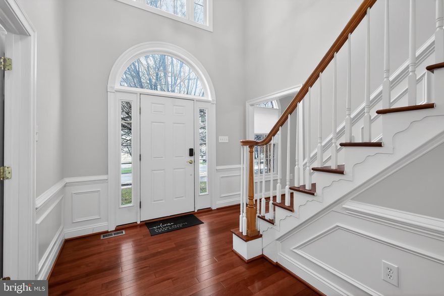 This gorgeous brick front Colonial offers a seamless blend of elegance and functionality across three fully finished levels. A dramatic two-story foyer welcomes you into a flowing open floor plan, highlighted by gleaming hardwood floors on both the main and upper levels. The gourmet kitchen features granite countertops and a sunny breakfast area, while French doors lead to a spacious deck perfect for entertaining or quiet retreats.

The upper level boasts a sprawling Primary Suite with walk-in closets and a luxurious spa-like bath, plus three additional generously sized bedrooms and two full baths. The renovated basement provides an expansive second living space with new vinyl flooring, a full kitchen, a bedroom, and a full bath—ideal for guests or an au pair suite. Recent updates include a new roof (2026), fresh interior paint throughout, and updated lighting. Located in the top-rated Wootton HS district with easy access to I-270, shopping, and dining.