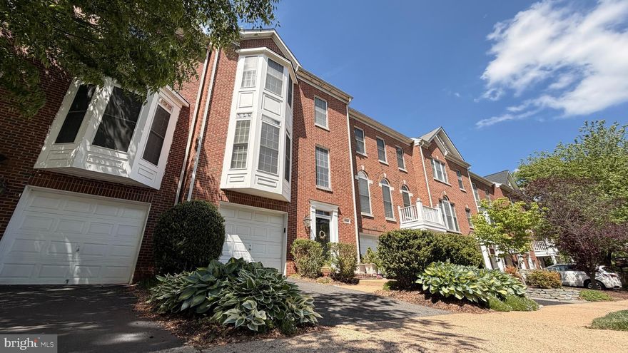 Rare opportunity to own a beautifully maintained three-level brick luxury townhome offering exceptional space, privacy, and versatility in pristine move-in condition. Featuring two spacious primary suites (tax record reflects 3 bedrooms) and rare rear extensions on all three levels, this home showcases hardwood floors throughout and meticulous upkeep.
The ground-level entry opens to a generous recreation room with an adjoining den/office space and full bath, with French doors leading to a fully fenced brick patio backyard. This flexible space functions perfectly as a private guest suite or optional third bedroom suite.
The main level features an open-concept layout filled with natural light, offering formal living and dining areas and a convenient powder room. The gourmet kitchen serves as the heart of the home, with granite countertops, stainless steel appliances, and seamless flow into a spacious family room with a cozy gas fireplace. A sunroom/dining area extends to a private deck, ideal for morning coffee, entertaining, or quiet evenings outdoors.
Upstairs, two oversized primary suites provide exceptional comfort and privacy, each with generous closet space and well-appointed en-suite baths.
Ideally located near shopping, dining, entertainment, and major commuter routes, this home offers the perfect blend of space, convenience, and refined living.
The location is truly exceptional, with Wegmans conveniently situated right across the street and Fairfax Corner just minutes away, providing a wide variety of shopping, dining, and entertainment options. Commuters will also benefit from quick and easy access to several major routes, ensuring a smooth and convenient daily commute.