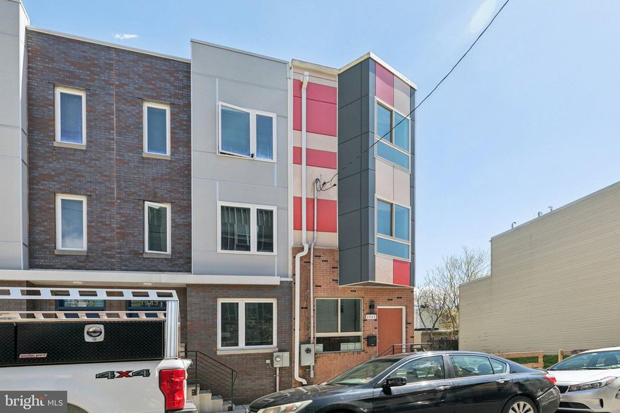 Experience modern urban living in this stunning 2,200 SF new construction home located in the heart of the vibrant Hartranft neighborhood. Designed with both homeowners and investors in mind, this spacious 4-bedroom, 3-full-bathroom residence features high-end finishes and an open-concept layout perfect for contemporary city life. The crown jewel of this property is the expansive private roof deck, offering breathtaking, unobstructed views of the Philadelphia skyline—an ideal space for entertaining or relaxing. Situated on a 12' x 52' lot just blocks from Temple University, the location provides an unmatched advantage for student housing or a primary residence. Residents will enjoy immediate proximity to the Temple University Regional Rail Station, Paseo Verde, and a variety of local shops and dining. Whether you are looking for a high-yield investment property in a high-demand rental corridor or a sleek new home with premier city access, 1941 N 9th St delivers the perfect balance of luxury and convenience.