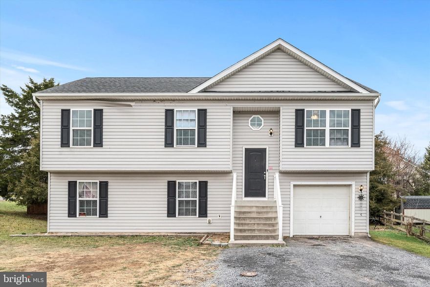 Welcome to 11 Eisenhower Circle! Check out this 3-bedroom, 2-full bath split-level home in the Inwood Meadows neighborhood. With a spacious open concept design, this home offers high ceilings in the living room and kitchen, creating an airy, light-filled atmosphere perfect for family gatherings and entertaining.
The generous primary bedroom features its own en-suite primary bath and two closets. The home’s spacious basement is roughed in and ready for your finishing touches, offering endless potential for additional living space, a home office, or recreational area. Enjoy the convenience of a 1-car garage, and a location that offers easy access to major routes, shopping, dining, and local amenities in Inwood.
While the home does need some cosmetic work, it boasts great bones and is a fantastic opportunity to make it your own. This home is being sold AS-IS—don’t miss out on the chance to create your dream home in a great neighborhood!