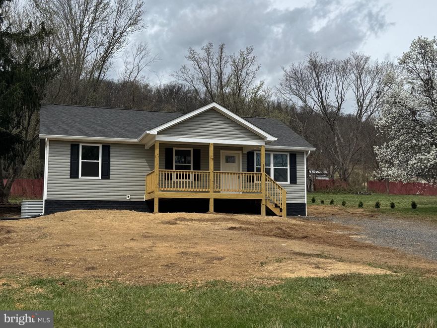 Conveniently located a short distance off of US Rt 50 in Augusta WV sets this NEW Built 3 bedroom 2 bath home waiting to be occupied.  Home sets on approximate 1/2 acre of easy maintenance.  The covered front porch offers the perfect location to enjoy the upcoming April Showers.  The back deck has room for grilling and provides a little privacy.  The back yard is just the right size for a garden or play area.  Seller will also be adding a fence to the right side of the property line.  If your need is to have a garage, there is room for a future build.  With such a limited inventory this one won't last long.