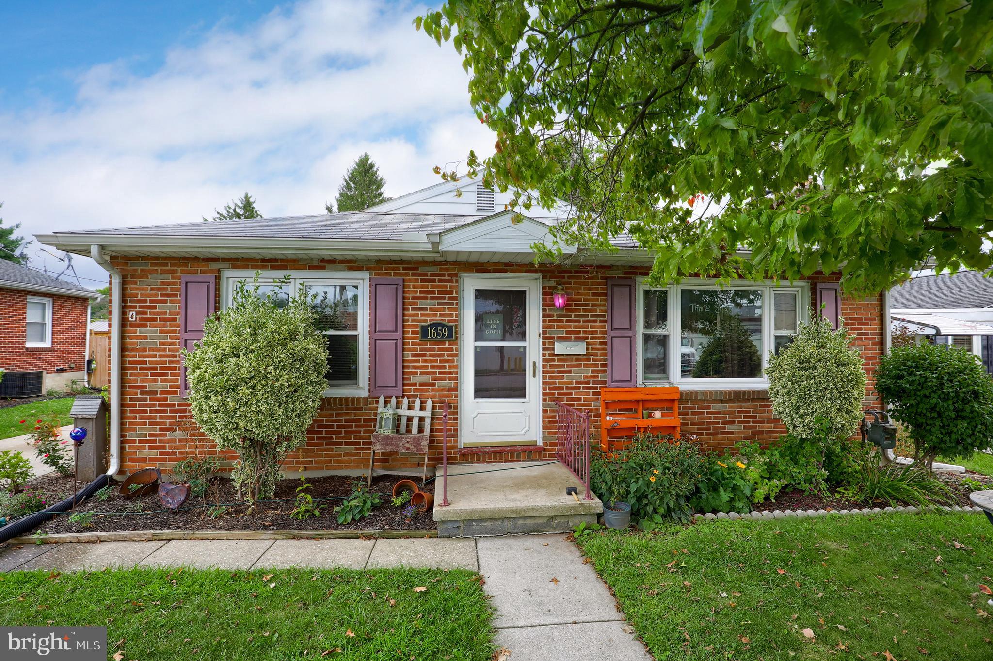 Sturdy brick rancher on a level lot in Suburban schools! Main floor features hardwood, living room with fireplace, eat-in kitchen with newer cabinets and tile floor, 3 bedrooms and a full bath. Lower level with partially finished basement and additional full bath. Nice flat yard with patio area. Great location close to I83 and shopping.