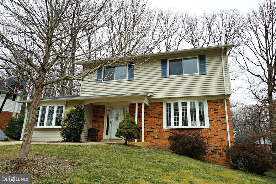 Now's Your Chance!!!   Back on the market and ready for March settlement!  Fresh paint!  New carpet! New lighting!  Stunning hardwood floors on top two levels!  Fabulous renovated kitchen!  Enjoy the spacious screened porch and a nice deck in treed backyard!  Finished lower level with large rec room!  Gorgeous Lake Royal and park at the end of street! Community pool close by!