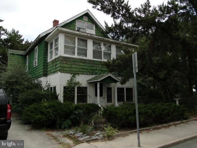 Redevelopment Potential!!! Three commercial oceanblock lots. (Tax ID number 089271 and 089298, which are lots 12, 13 & 14 on 82nd Street) Two of the lots currently have beach cottages on them, the other lot is wooded. The value here is in the land, not the structures. This property has southern exposure with great ocean views.