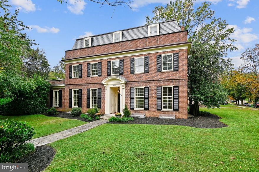 Gracious Guilford Georgian on landscaped corner lot. This 7 bedroom, 3 full bath/2 half bath home offers plenty of space for family and entertaining. Enter through the front portico to a spacious foyer with an elegant library/office with built-ins to your right and a formal living room with wood burning fireplace to your left. Beyond the living room is a cozy den/sun room which leads you into the large eat-in kitchen with coffered ceilings. A butlers pantry, large dining room with plantation shutters, and a half bath complete the main level. Second level houses the primary bedroom suite with a roof top terrace attached, large walk-in closet, and 2 bedrooms with a jack & jill bath. Top level provides 4 more bedrooms and a hall bath. Finished lower level has a large rec room with new flooring, laundry room, half bath, and plenty of storage. Just waterproofed with a 5 year warranty. Recent renovations also include all new custom shutters, new water main, refinished hardwood floors, and freshly painted throughout. Spacious yard with stone patio. 2 car garage & 2 zoned A/C.