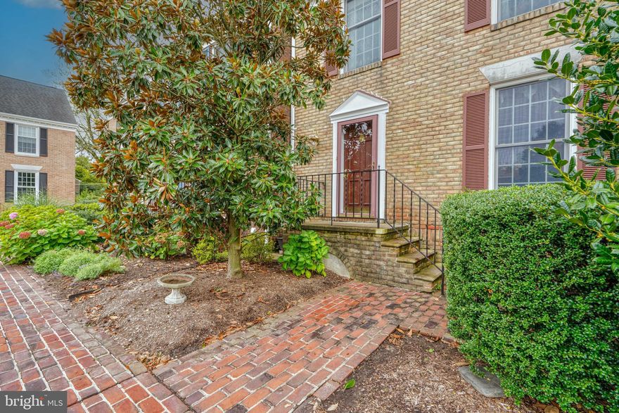 Interior Brick Townhouse with Hardwood Floors on the Main Level, Woodburning Fireplace with Mantle in the Living Room, Built in Bookcases, 2 Assigned Parking Spaces, Private Community, Custom Moldings, Window Treatments, Oil Heat, Electric Hot Water Heater.