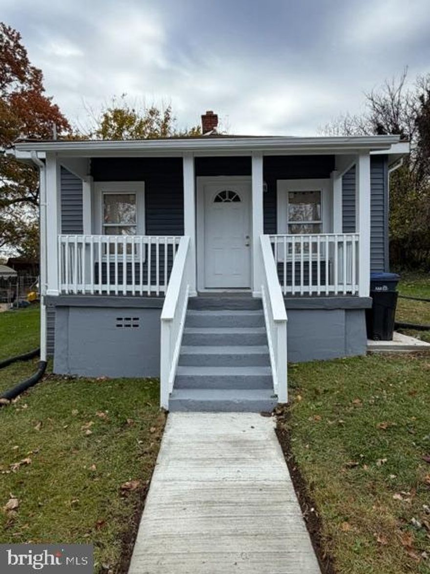 Newly rehabbed home.  Kitchen is a chef's delight.  Nostalgic Front Porch. Big level lot. Brand new flooring.  Brand new paint.  Brand new window coverings.  Central HVAC.  Level flat lot.  Excellent location.  Close to DC Federal Job Employment market. Big $ 39,000 price drop.
