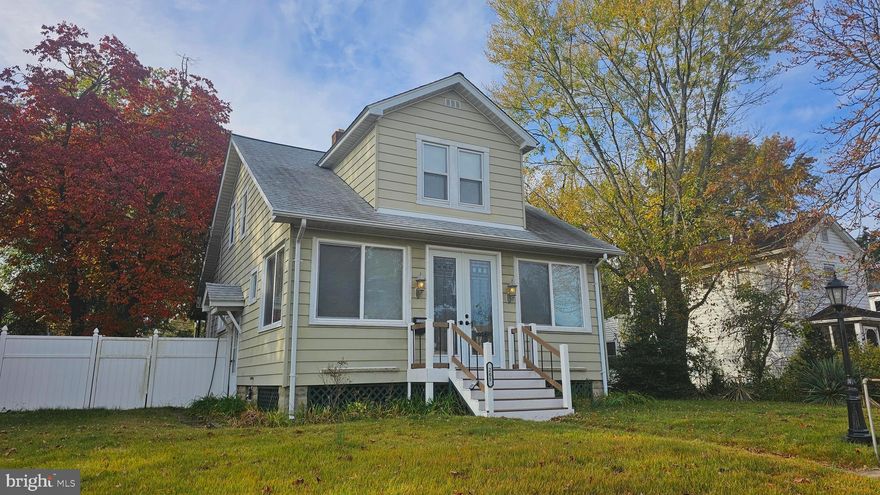 This charming Cape Cod-style home in the Glen Burnie neighborhood offers a delightful blend of comfort and convenience. Built in 1946, this detached residence features a well-maintained interior with hardwood and ceramic tile flooring, creating a warm and inviting atmosphere. The kitchen is equipped with modern stainless-steel appliances, granite countertops, breakfast bar, stools, a built-in microwave, dishwasher, and gas oven/range, making meal preparation a joy.  The unfinished basement offers potential for customization, while the laundry area is conveniently located in the basement, featuring a front-loading washer and dryer. and lots of storage. Enjoy outdoor living on the spacious deck, small refrigerator and outdoor sink, perfect for gatherings or quiet evenings under the stars. Let's not forget the spacious private fenced back yard, 2 garages that will store 3 cars that include electric and garage door openers that face the paved alley.  Glen Burnie is a vibrant community with a wealth of amenities. Residents benefit from nearby parks, providing green spaces for recreation and relaxation. The area boasts excellent public services and is conveniently located near schools, ensuring easy access to quality education. Available for lease starting December 1st, 2025, with a minimum lease term of 12 months, this property includes HVAC maintenance and trash removal for added convenience. With a detached garage offering additional storage and on-street parking, this home is designed for modern living. Experience the warmth and charm of Glen Burnie-your new home awaits!