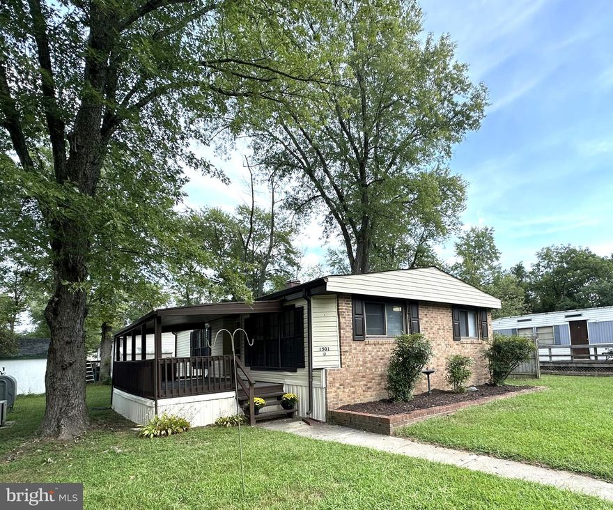 Seller will pay first two months lot rent for a contract by 11/07/2023! Beautifully Renovated Double Wide on Quiet Cul-de sac in Sought After Maryland Manor! Over 1600 square feet of Living Space with Many Updates Including New Laminate Floors, New HVAC System, New Quartz Kitchen Counters, New Double Shower Stall in Primary Bathroom, New Light Fixtures, New Ceiling Fans, New Carpet in Bedrooms and New Paint Throughout. Inside Features Large Country Kitchen with Pantry,  Breakfast Bar and Separate Dining Area.  Big Living Room with Fireplace Heatilator. Large Primary Bedroom with Private Bathroom. Home sits on Nicely Landscaped Lot with a Covered Front Deck and Big Secure Storage Shed. Close to Schools, Parks, Shopping and Restaurants. Close to Rt 4 and Rt 301. 30 Minutes to DC and Annapolis. 20 Minutes to Andrews AFB. Community Features Big Tot Lot. Don't Delay this one won't last!