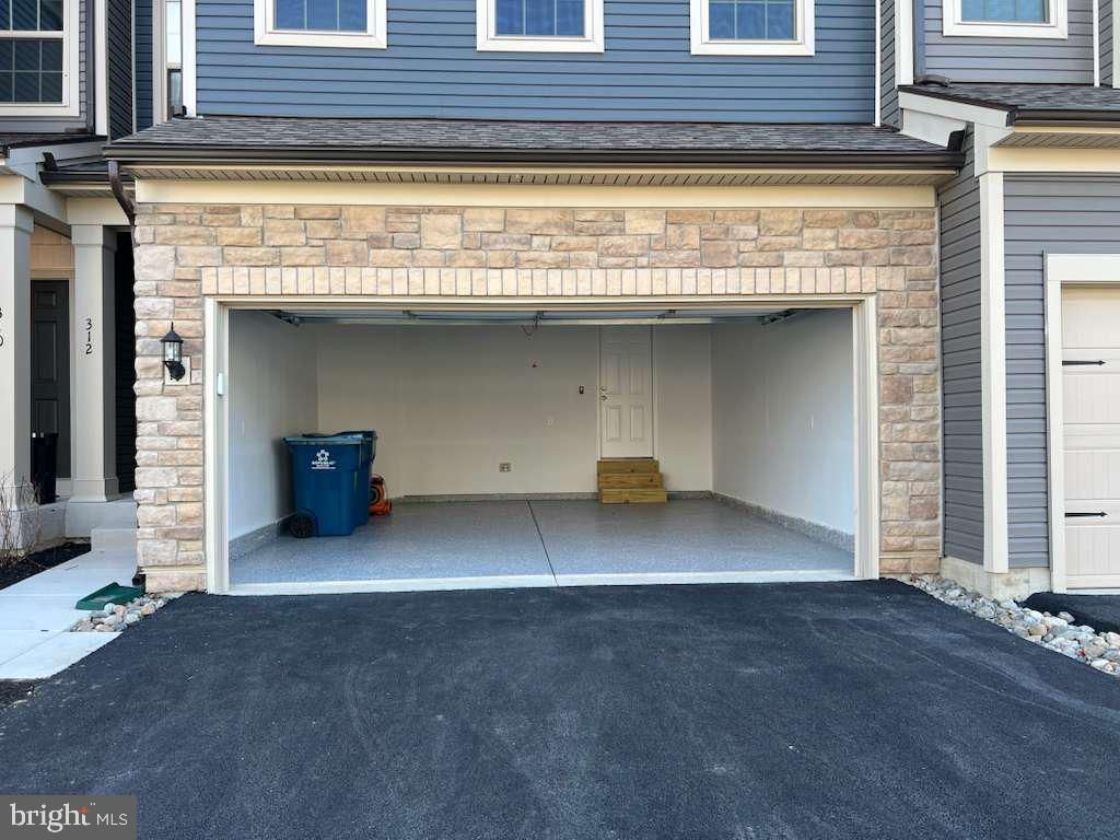 Photo of 312 Milton Stamp Drive, GLEN MILLS, PA 19342 (MLS # PADE2099310)